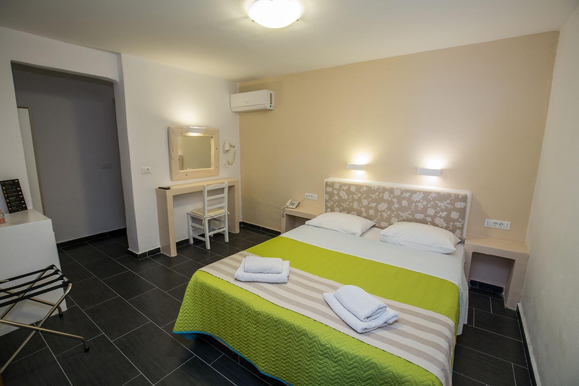Omiros Hotel Мессария Экстерьер фото