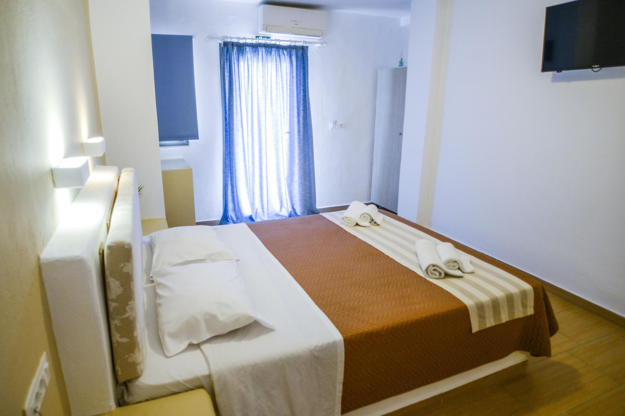 Omiros Hotel Мессария Экстерьер фото
