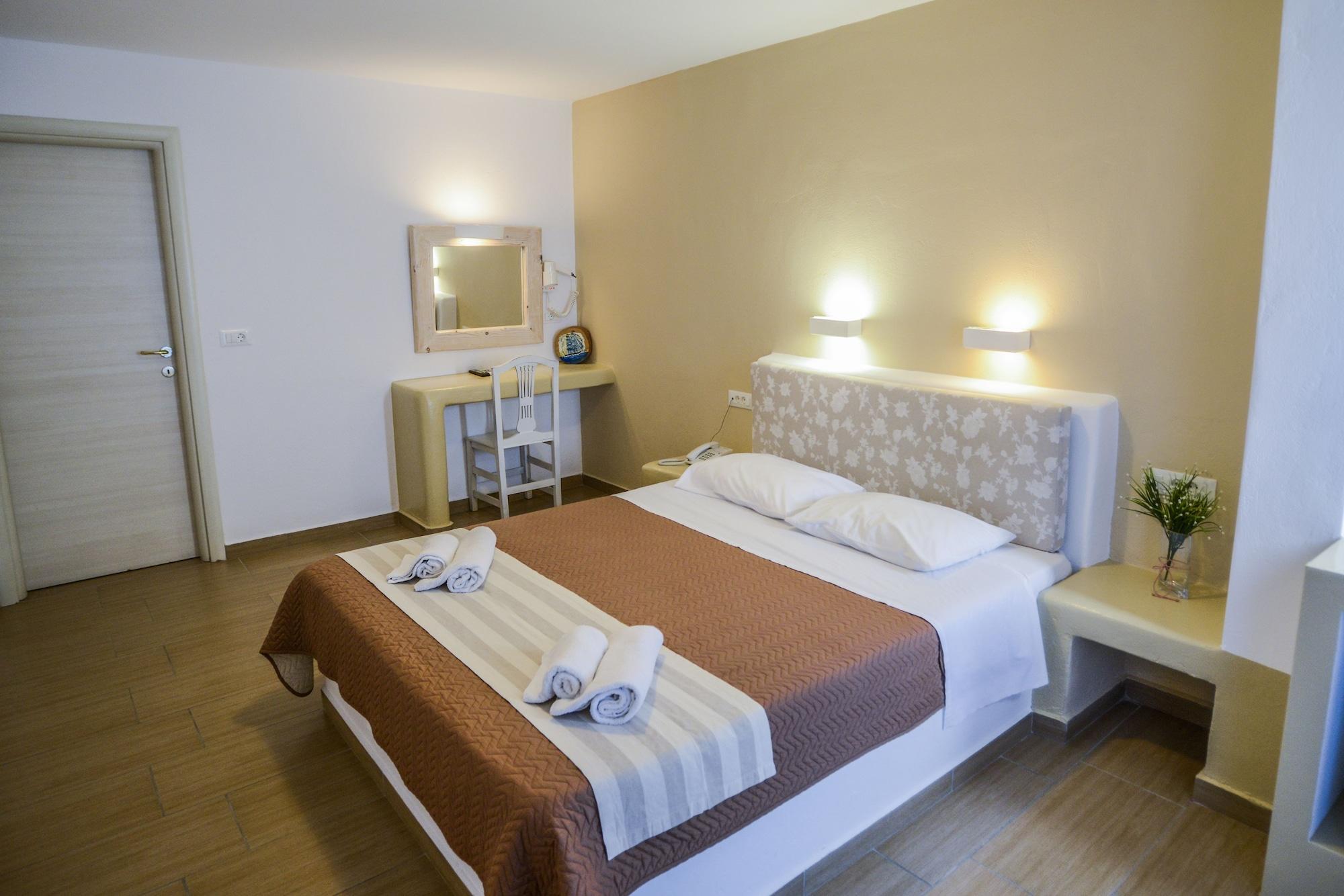 Omiros Hotel Мессария Экстерьер фото