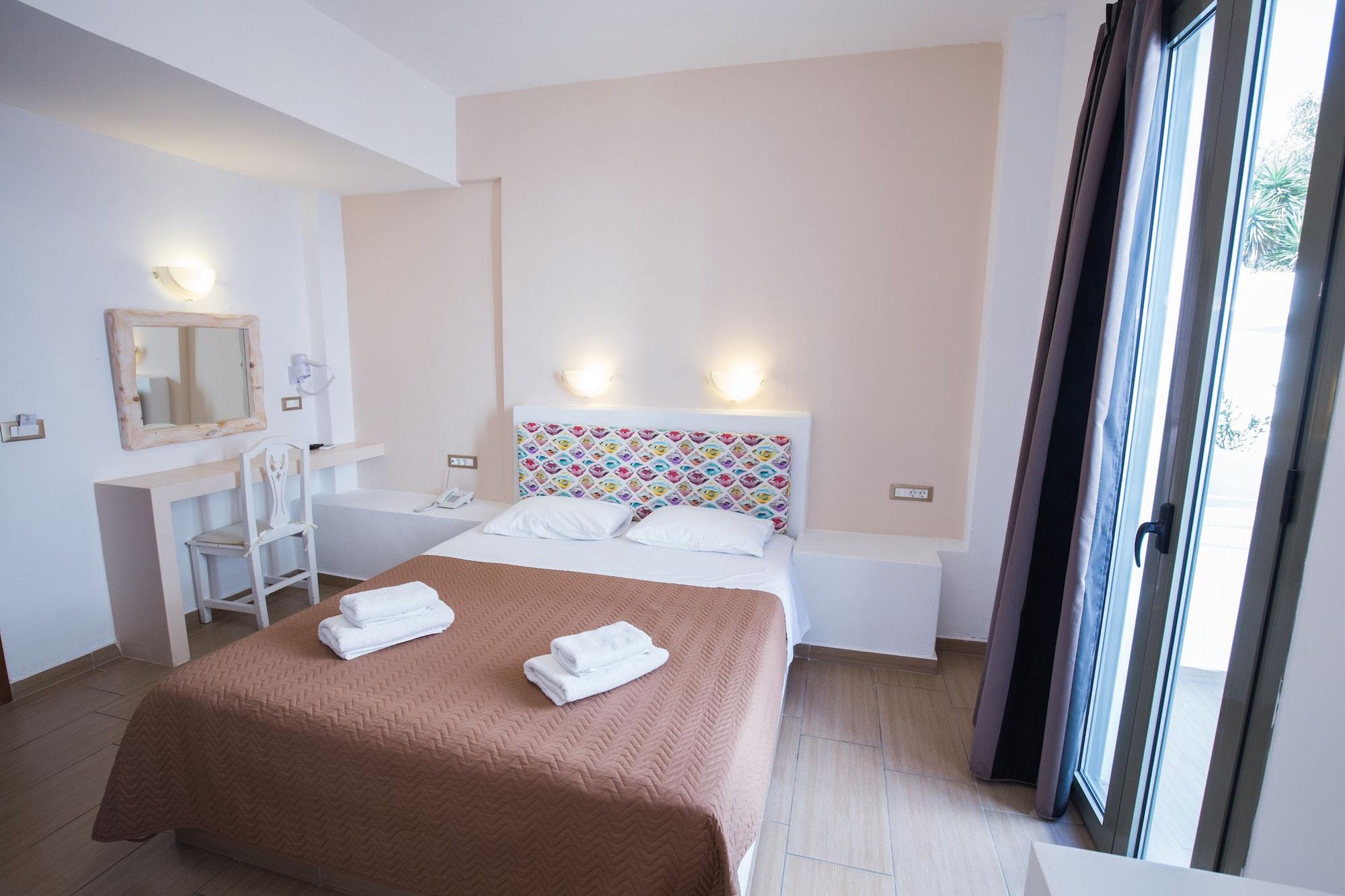 Omiros Hotel Мессария Экстерьер фото