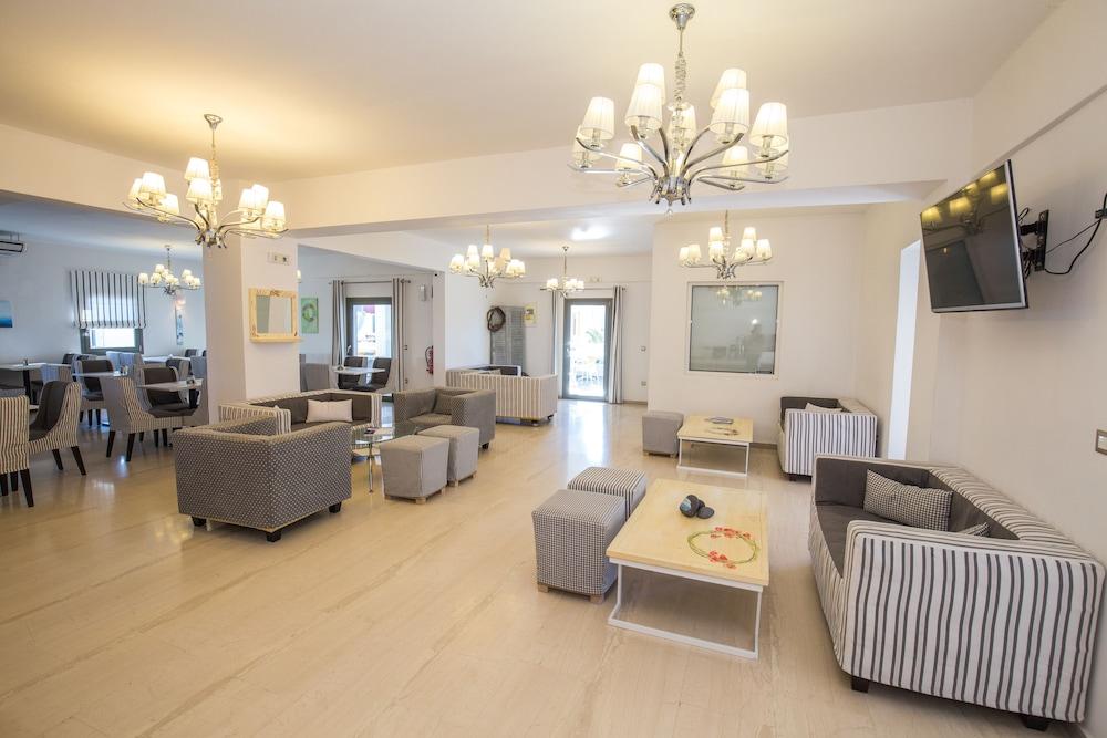 Omiros Hotel Мессария Экстерьер фото