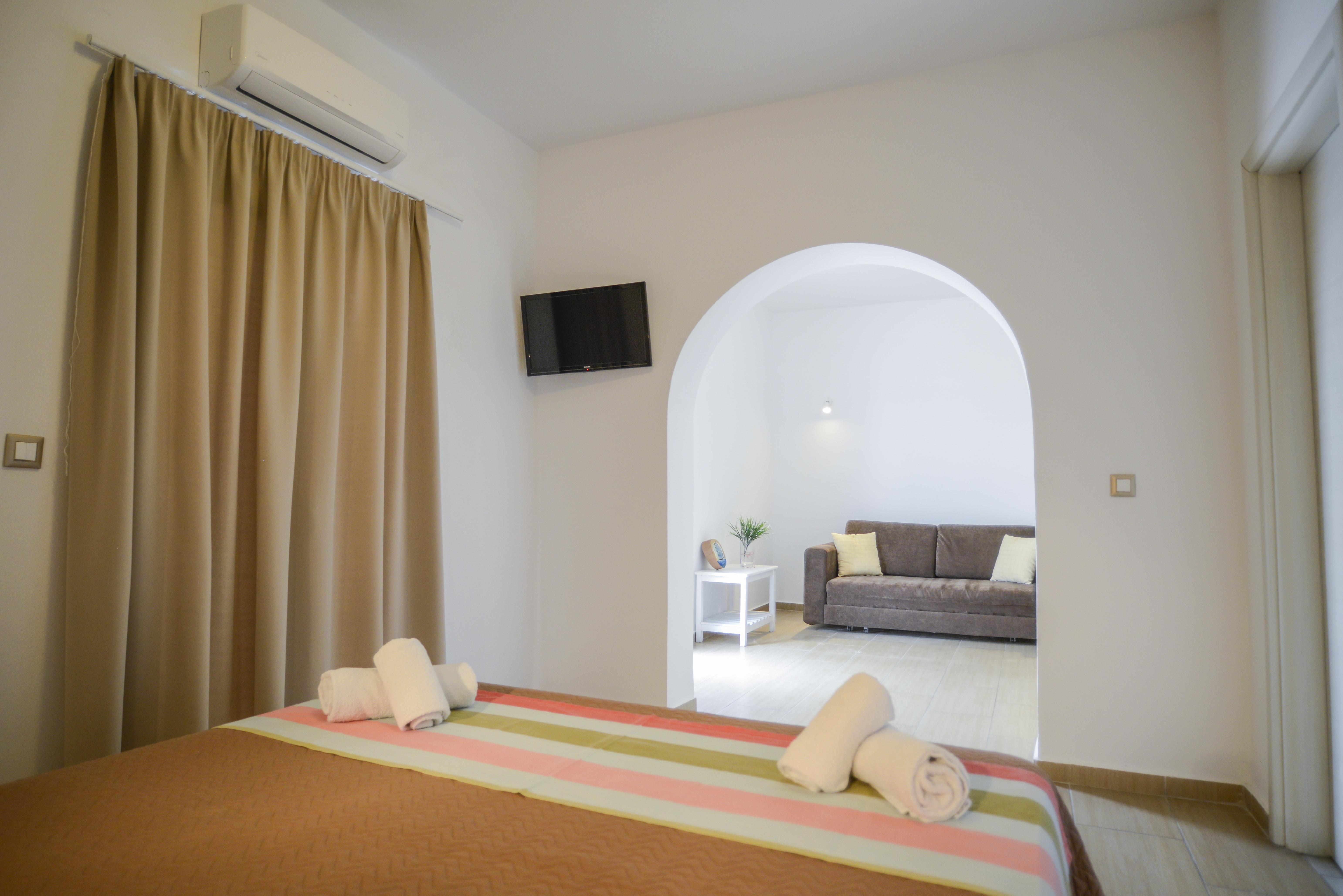 Omiros Hotel Мессария Экстерьер фото