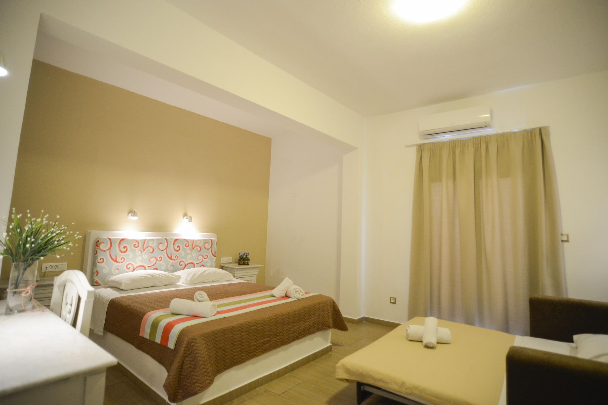 Omiros Hotel Мессария Экстерьер фото