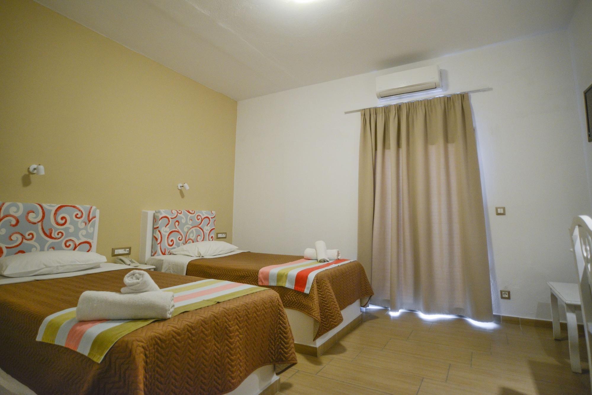 Omiros Hotel Мессария Экстерьер фото